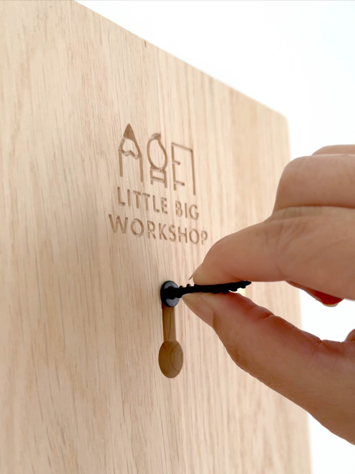 Keyhole on the back of our Wooden Height Rulers and screw for hanging (screw not included)