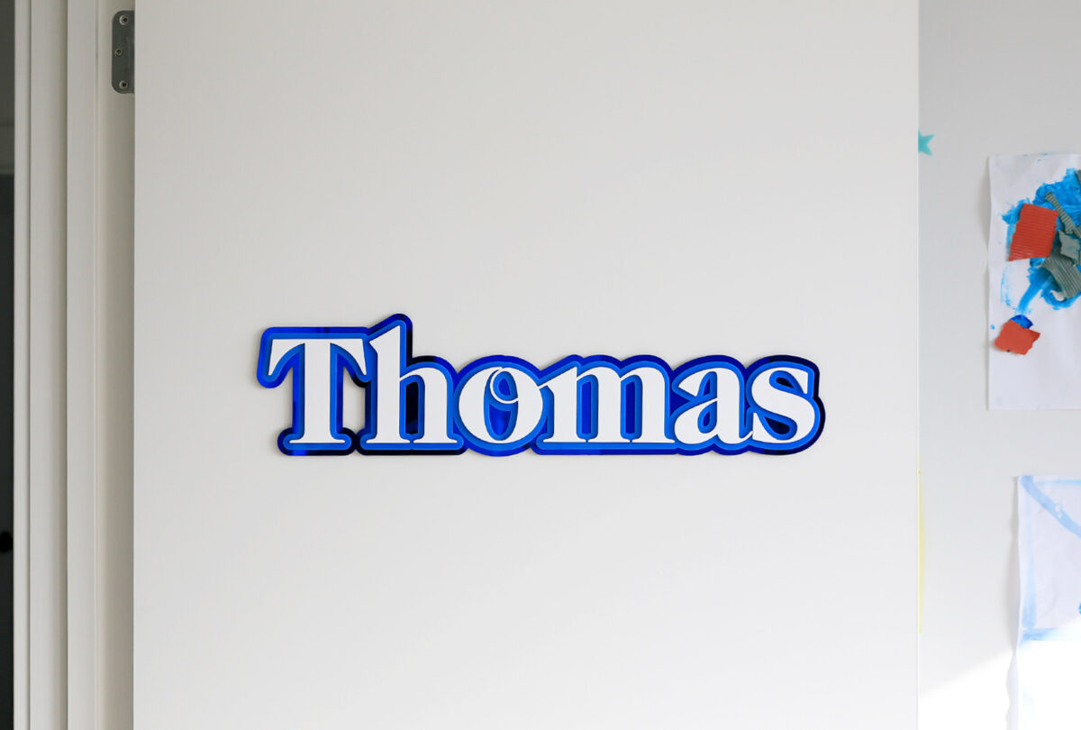 Blue and white acrylic name plaque