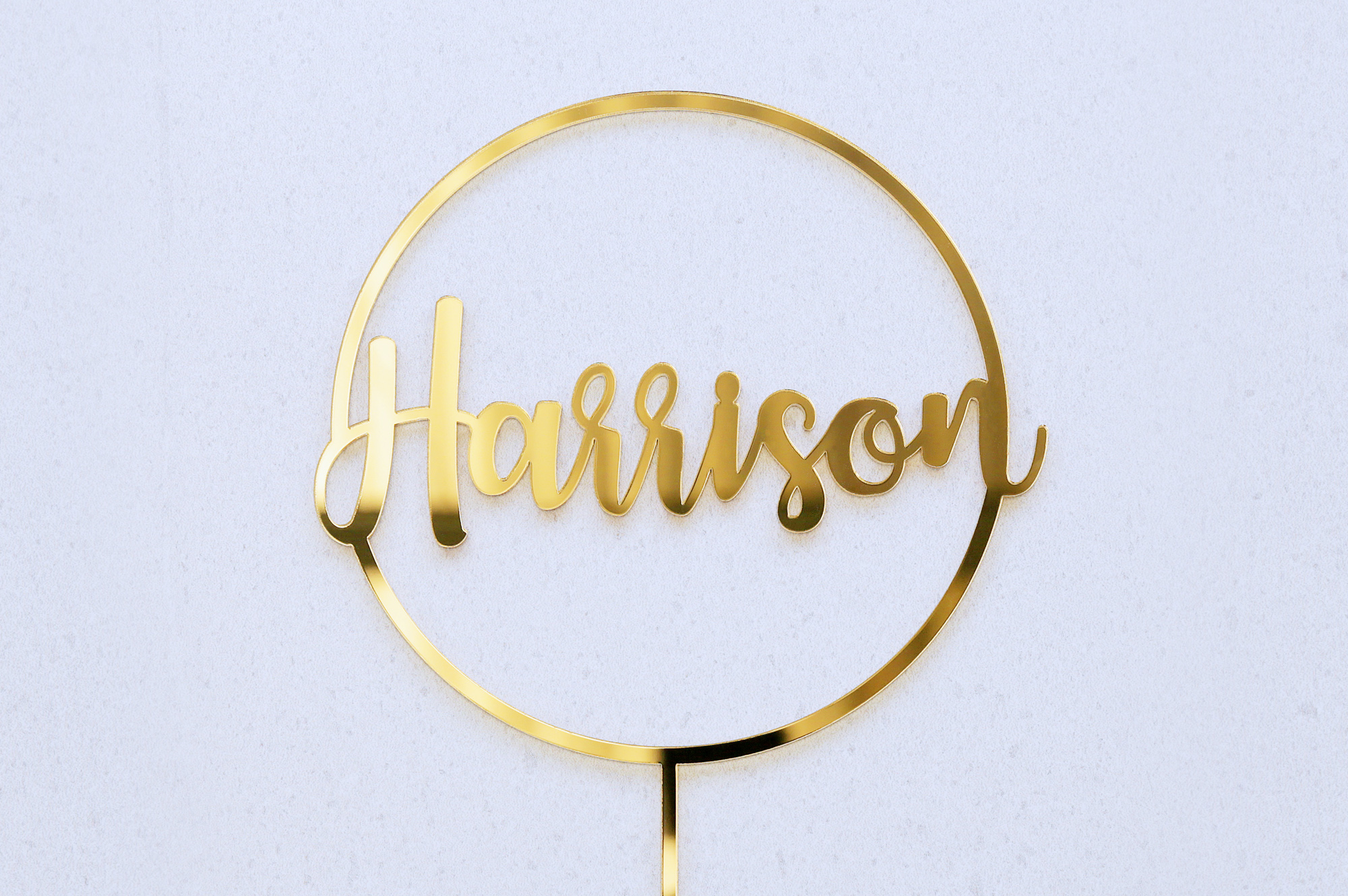 Gold Halo cake topper with Harrison in the centre