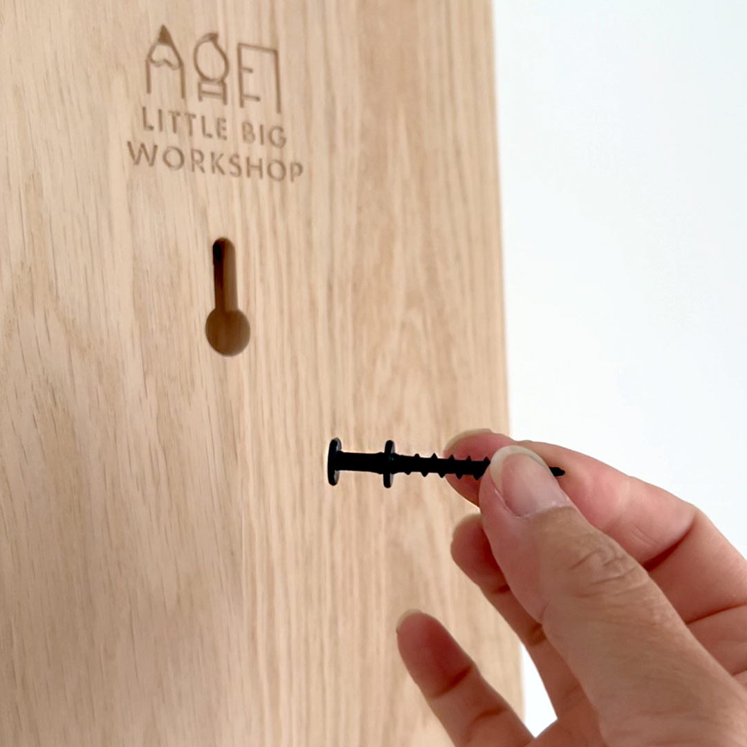 Keyhole on the back of our Wooden Height Rulers and screw for hanging (screw not included)