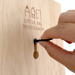Keyhole on the back of our Wooden Height Rulers and screw for hanging (screw not included)